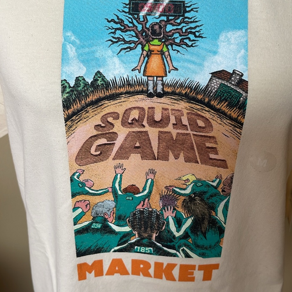 NWT NETFLIX MARKET X PACSUN SQUID GAME SHORT SLLEVE CREAM TSHIRT MED - Picture 3 of 6